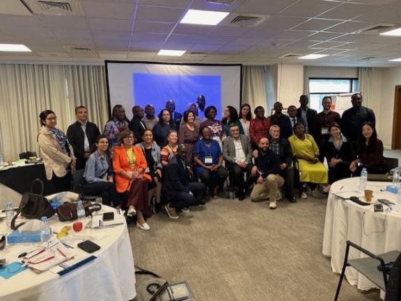 IIU staff and participants in the workshop gather for a group photo.